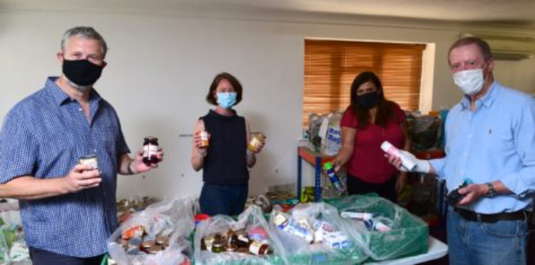 content/AP/SGB-115-Foodbank-manager-Annette-Medhurst-centre-left-and-volunteers-with-the-foodbank-donation.jpg